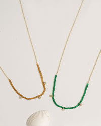 Beaded necklace with mixed crystal and gold bead accents