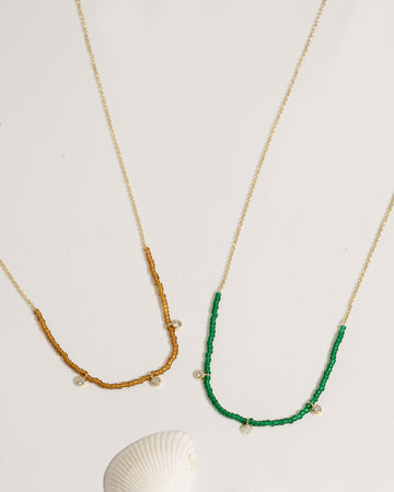 Beaded necklace with mixed crystal and gold bead accents